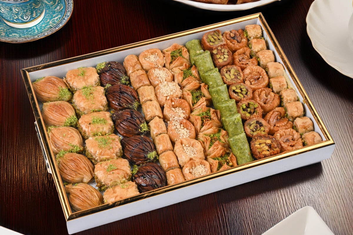 Assorted Baklava Tray from Zmzm Sweets – includes layers of flaky pastry with pistachios, cashews, and sweet syrup.